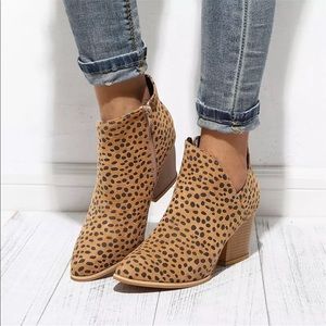 Gorgeous slit vegan suede leopard ankle boots. They run small, so never worn.